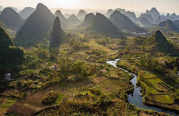 Sunset over rice paddies, Guilin, China