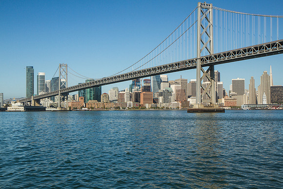 Bay Bridge and San Francisco skyline at sunrise