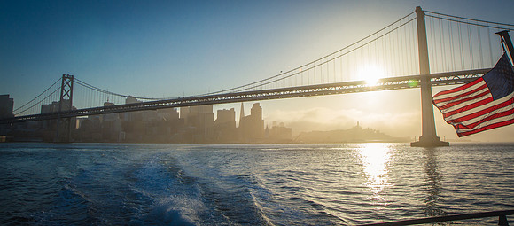 Bay Bridge and San Francisco skyline at sunset